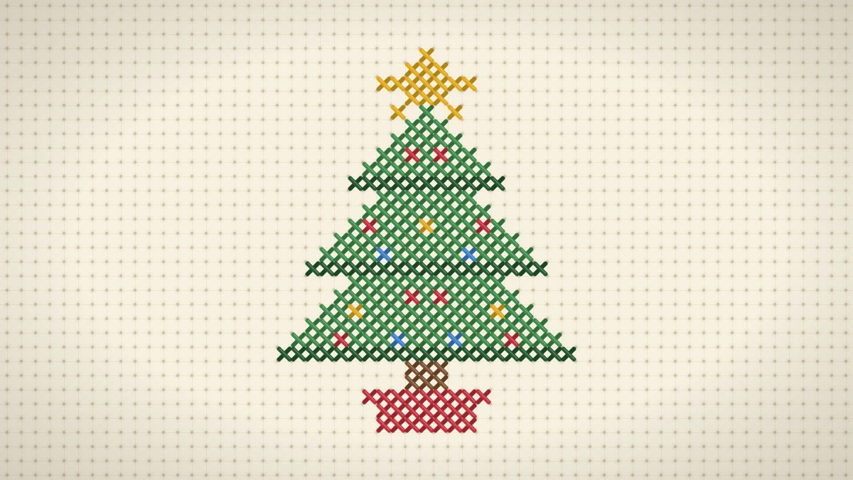 Small green Christmas tree with gold star, colored baubles and red pot cross stitched on cream Aida