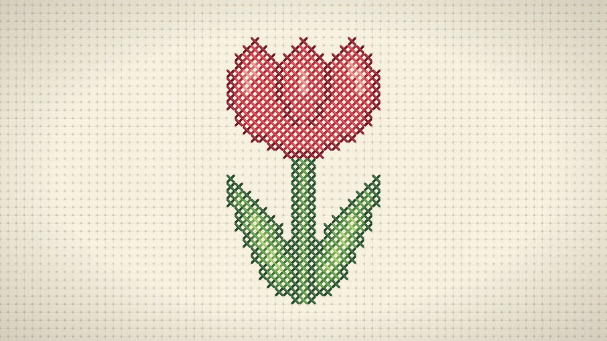 Stitched red tulip with three shaded petals, a green stem and two long leaves on cream Aida